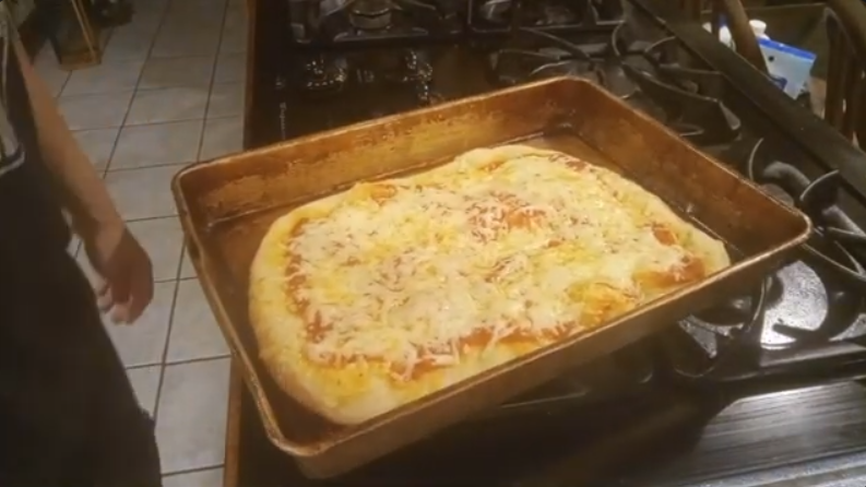 Mostly cooked pizza