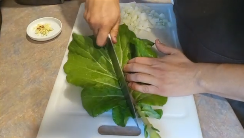 Episode Seven chopping Collard Greens